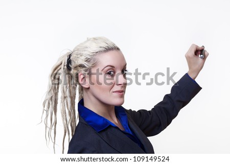 Business person with dreadlock hair holding a marker pen in the air at a blank area for sign or copyspase