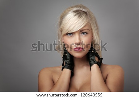 sexy woman wearing leather driving gloves