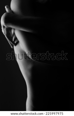 nude black and white abstract form and shape of a young women