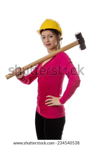 woman holding a sledgehammer and wearing a hard hat about to smash something
