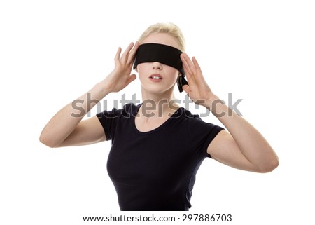 woman wearing a blindfold not sure what to do