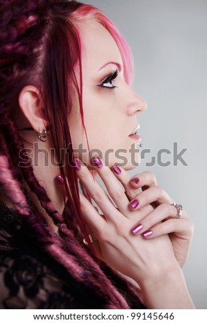 side profile of a woman with dread lock hair