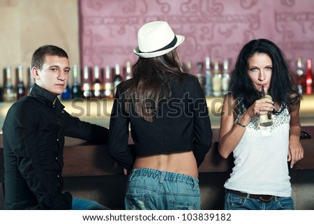 Fashion style photo of a people in the bar