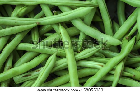 Image of the green beans (Phaseolus vulgaris), focus pointed at the middle of the green beans and shallow DOF