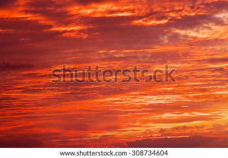 Fiery orange sunset sky. Bright orange, red and yellow colors sunset sky. Light after the sunset