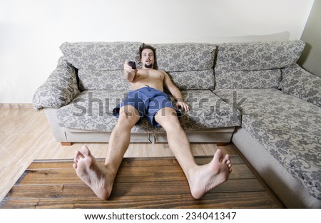 Man like couch potato watching tv