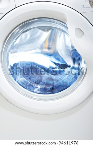 clothes washer with blue denim