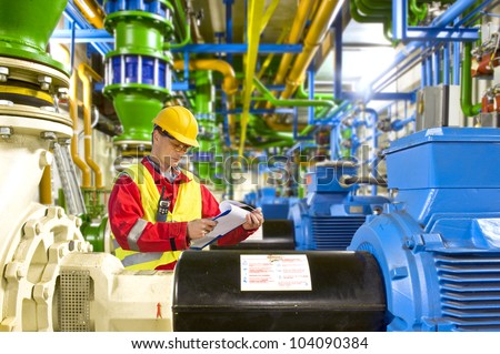 Similar – Image, Stock Photo Mechanic reading document in workshop