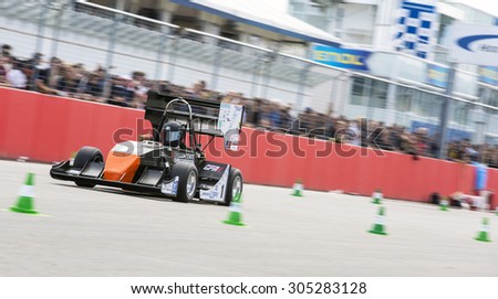 HOCKENHEIM, GERMANY - AUGUST 1, 2015: The Global Formula Student combustion powered car at full speed during the accelleration of the design competition of Formula Student Germany