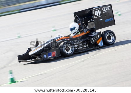 HOCKENHEIM, GERMANY - AUGUST 2, 2015: The combustion race car of the university of Munich in action at the dynamic endurance event of the  world championships of the Formula Student Design Competition