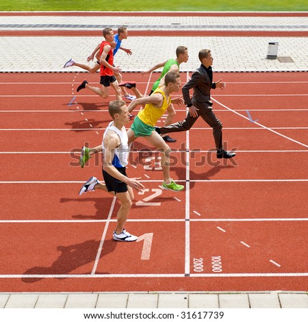 Business metaphore of staying ahead, winning in business,business competition, and continuous improvement, represented by a photo finish of a track race