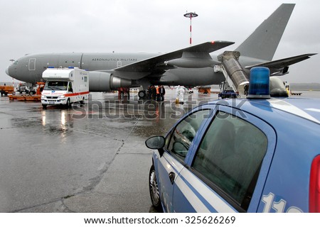 MILAN MALPENSA - NOVEMBER 12, 2014: Ebola emergency simulation in Malpensa. A bogus infected patient has arrived in the airport, and then carried to 