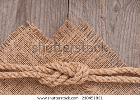ship rope on wooden texture background