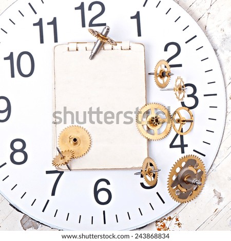 old technology background, paper and old mechanical clock gear