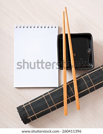 Sushi menu chopsticks for sushi on bamboo napkin