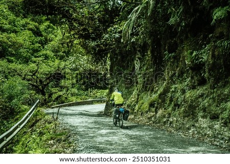 Similar – Image, Stock Photo Cyclist appears on the line from the airfield