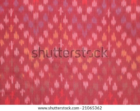A silky red designed background with cloth