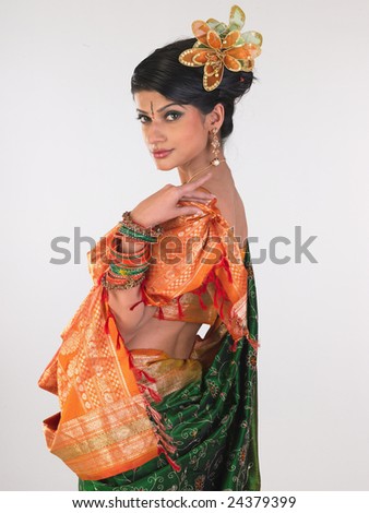 Woman in sari with side posture