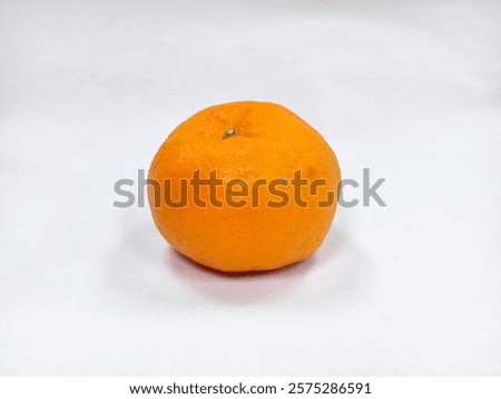 Similar – Image, Stock Photo unpeeled round ripe orange mandarin