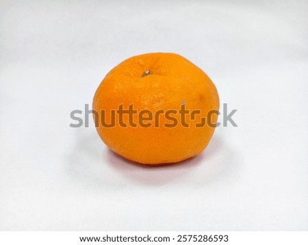 Similar – Image, Stock Photo unpeeled round ripe orange mandarin