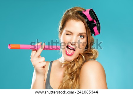 Colorful image of a funny woman with snorkleing gear.