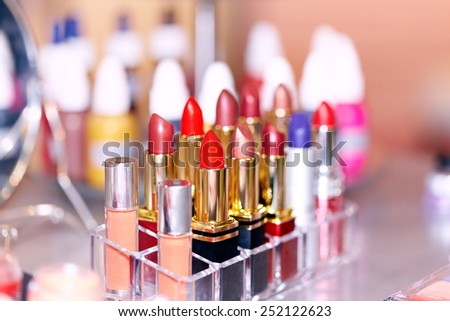 Makeup products arranged on counter.