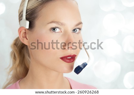 Customer support woman wearing headset.