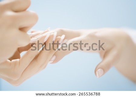 Woman getting her nails done.