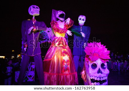 AGUASCALIENTES, MEXICO, NOV 02: Figures of skeletons on a carnival of the Day of the Dead, Aguacalientes, Mexico, 02 November 2013. The Day of the Dead is one of the most popular holidays in Mexico