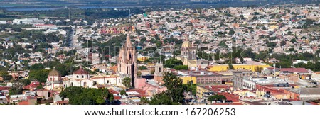 SAN MIGUEL DE ALLENDE, MEXICO - DEC 07: La Parroquia (Church of St. Michael the Archangel) and the Temple of the Nuns in the historic Mexican city of San Miguel de Allende, Mexico, 07 December, 2013.
