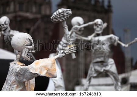 MEXICO CITY, MEXICO, NOV 30: Huge sculpture of skeletons on a main square of Mexico City during a holiday Day Dead, Mexico, 30 November, 2013. Day Dead is the most popular holiday in Mexico