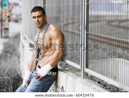 sexy rude man in a grunge background