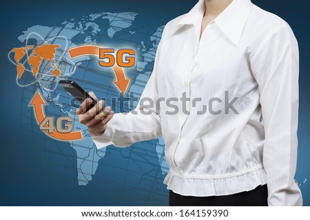 Businessman holding a smartphone. Concept for business communication on the network interface to Internet and world wide web connection on speed 5 generation.