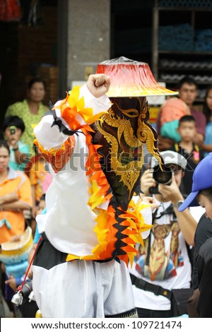 LOEI PROVINCE,THAILAND-JUNE 23:Unidentified men wear ghost costumes at Ghost Festival (Phi Ta Khon- a masked procession celebrated by Buddhist)  Dan Sai district in Loei Province on June 23, 2012.