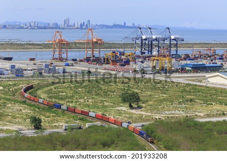 Cargo train platform outgoing  from harbor with container