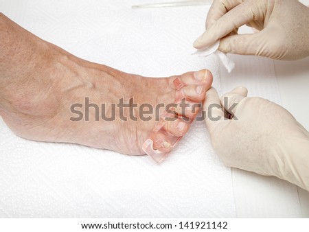 Process of foot nail varnishing, series of photos, Close up of a beautician preparing and applying a nail polish  to a client's feet, series of STEP BY STEP nail varnishing process,  selective focus