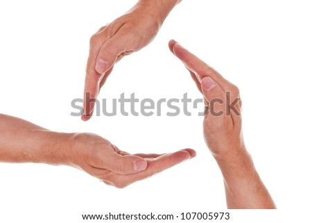 a circle of three hands