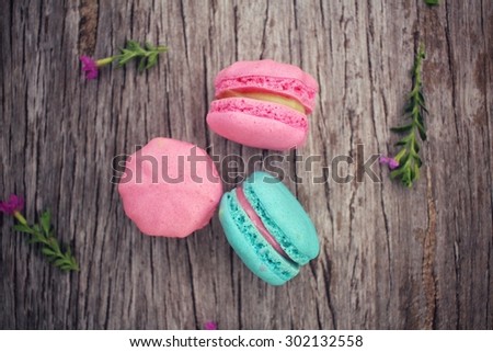 French macaroons with pink flowers