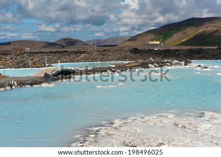 Blue water of the famous Icelandic Blue Lagoon spa is produced by near geothermal plant. The spa is located on Reykjanes peninsula not far from Keflavik airport and Reykjavik capital, Iceland.