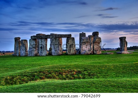 Historical monument Stonehenge not far from town of Amesbury at sunset, England. HDR
