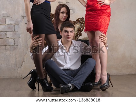 Portrait of three women and one guy posing in a close up shot