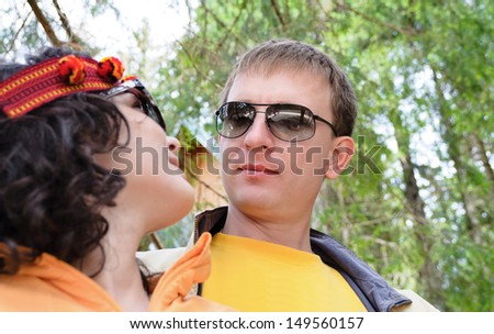 Closeup portrait of a romantic young couple with the husband looking tenderly at his wife