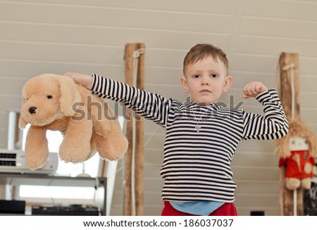 Similar – Foto Bild Junge hält sein Stofftier im Park