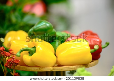 Fresh Bell Pepper healthy paprika, sweet pepper vegetable green yellow red Bell Pepper food fresh healthy natural paprika on brown bamboo tray