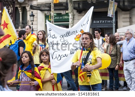 BARCELONA, SPAIN - SEPTEMBER 11: People and unidentified kids joining the human chain \