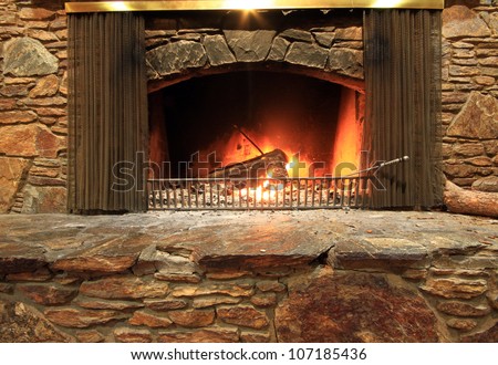 The fireplace, where everyone want to sit behind.