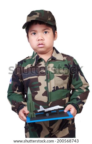 soldier boy holding battle plan on white background with clipping path