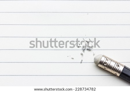 pencils have erasers written on white with the end of a pencil erasing the black letters showing eraser marks making a great concept