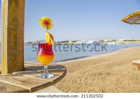 colourful cocktails by a tropical sea