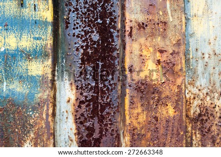 red rusted on the color metal wall with planks. background and Texture for your design.